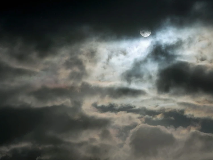Iridescent_clouds_during_snowfall by W Carter.jpg